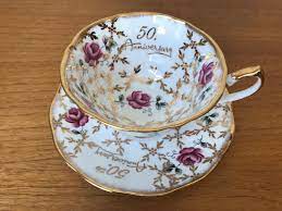 Browse royal doulton's pacific collection of coastal patterns from textured shells and crashing waves. 50th Wedding Anniversary Tea Cup And Saucer Elizabethan Gold Floral Pink Rose Teacup And Saucer Tea Cups Tea Cups Vintage Tea
