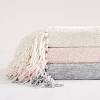 10 best throw blankets to achieve optimal coziness. 1