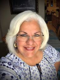 Delma Herrera, with Cox and Chicanos Por La Causa's board vice chair, goes 