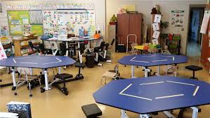 Kinesthetic Classrooms With Standing Desks Flexible Seating Wobble Chairs Pedal Desks And Bike Flexible Seating Classroom Flexible Seating Modern Classroom