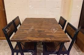 oak dining table with chairs in dark