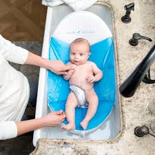 The cushy nest lite is a lightweight infant bather designed with an oversized mesh sling and a sturdy plastic base. Baby Delight Cushy Nest Cloud Bather Blue Walmart Com Walmart Com