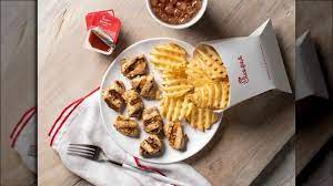 Take the chicken nuggets and coat with flour, dip in egg and cover with the panko/oregano mix. The Surprising Truth About Chick Fil A S Grilled Nuggets
