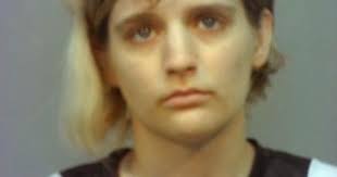 Daughter of convicted murderer gets nine years for her role in cover-up