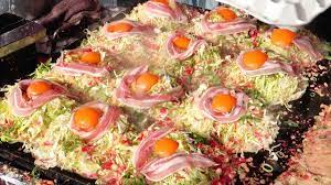 Okonomiyaki literally means 'grilled as you like it'. Japanese Street Food Okonomiyaki Seafood Pancake Japan Youtube