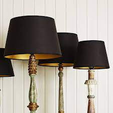 Table lamp shades should be a perfect fit, not just in terms of your personal style, but in terms of the size of the fittings for your particular table lamp. Black And Gold Retro Lamp Shades Graham Green