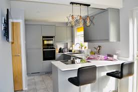 Light grey gloss kitchen with oak worktop offcuts applebee's near. Completed Projects Stonemill Kitchens