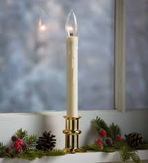 These Holiday Candles Have It All Battery Operated Adjustable Window Hugger Candles Feature A Slim Hugg Window Candles Simple Christmas Decor Holiday Candles