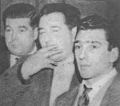 Teddy Smith (centre, seated with cigarette) in a group photo during the  1960s. Reggie Kray can be seen third right, and Limehouse Willy (far right),