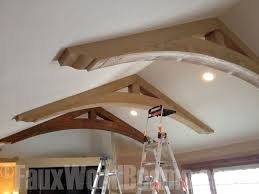 Wood Truss Designs Dress Up Any Ceiling With Ease Vaulted Ceiling Decor Faux Ceiling Beams Ceiling Beams Living Room