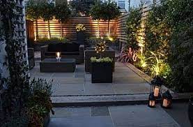 In the wide world of water features, nothing complements a landscaped outdoor space like a good fountain. Lighting Maybe One Too Many Lights In This Small Area But I Like The Effect Of The Up Outdoor Garden Lighting Garden Lighting Design Garden Lighting Effects