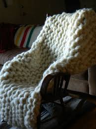 Knitter Makes A Giant Blanket With Rope Thick Wool Yarn And Pvc Pipe Knitting Needles