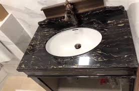 It comes with plenty of storage space and a white engineered quartz marble top. Fantasy Black Marble Bathroom Vanity Tops