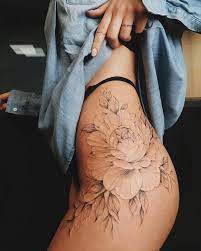 Black lotus flower tattoo on the left hip. Flower Tattoo Side Hip Tattoos Hip Thigh Tattoos Hip Tattoo