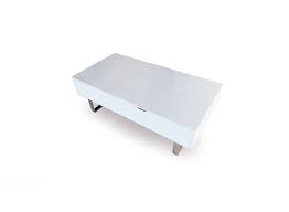 This distinctive piece serves a dual purpose by becoming a raised table/desk surface at the lift of a finger. Occam Coffee Table With Lift Top Expand Furniture