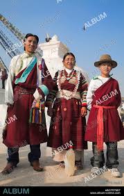 Tibetan family in traditional clothes ...
