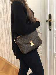 It's classic yet modern looking, very functional, lightweight and durable. Louis Vuitton Pochette Metis Monogram Canvas Luxury Bags