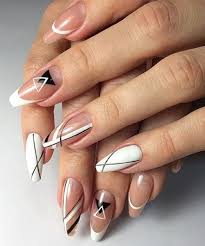 Actually geometric themes are used to pop up the nail arts as well. 40 Stunning Geometric Nail Art Designs Geometric Nail Geometric Nail Art White Nail Designs