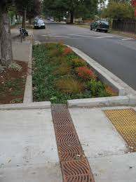 Using planters, bollards and other removable barriers; 12 Traffic Calming Ideas In 2021 Traffic Street Design Streetscape Design