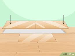 Laminate floor damage repair how to diagnose and fix stained, damaged laminate flooring products. 3 Ways To Repair Laminate Flooring Wikihow
