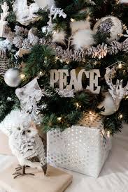 The history of christmas ornaments the idea of decorating a tree for christmas began in germany, where they used to add fruits and nuts to trees once the leaves fell off to symbolize the promise of spring to come. Winter Woodland Christmas Tree Decorating Ideas Parties With A Cause