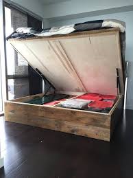 The platform lift allows you to easily store totes, luggage, and more! 10 Ways To Make Your Own Platform Bed With Storage Craft Coral Diy Storage Bed Diy Storage Platform Bed Platform Bed With Storage