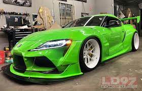 The supra starts at $50,920, including the mandatory $930 destination fee. 2020 Toyota Supra Rocks Rocket Bunny V1 5 Kit With Huge Wing Epic Lambo Green Autoevolution