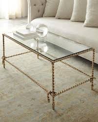 My approach | view project gallery the collier adjustable table features curved legs that can be repositioned to form three different table orientations. Chloe Coffee Table Neiman Marcus