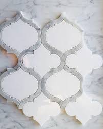 Polished stainless steel mosaic backsplash meshed on a 12 x 12 tile. White Thassos And Bianco Carrara Marble Waterjet Mosaic Tile In Arabesque Marrakech Arabesque Waterjet Mosaic Tile Mosaic