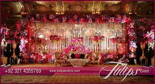 Tulips Event Best Pakistani Wedding Stage Decoration Flowering For Mehndi Walim Wedding Stage Decorations Pakistani Wedding Decor Engagement Stage Decoration