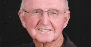 obituary for Norman L. Huskey