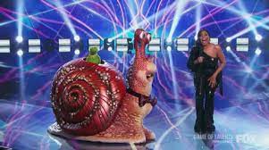 Niecy nash, filling in for normal host nick cannon. Masked Singer Us Unmasks Snail As Most Famous Guest Ever