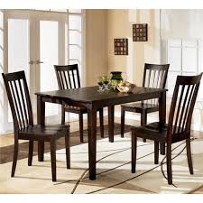 Shop our huge range of shapes, styles and designs including dining tables. Hyland 5 Piece Dining Set With Rectangular Table And 4 Chairs By Ashley Furniture At Marlo Furni Dining Room Table Set Dining Room Sets Ashley Furniture Dining