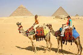 He's not going to rent you a camel at a loss to him. Young Adventuress Giza Pyramids