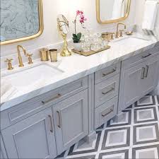 If floor is white go with same grey grout as grey cabinet and paint walls white. Gray Vanity With Gold Hardware Novocom Top