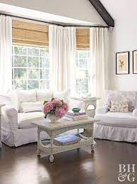 In this post, we are going over 8 bay window treatment options including roman shades, blinds & shutters. 12 Stunning Bay Window Treatments You Need To See In 2020 Window Treatments Living Room Living Room Windows Bay Window Treatments