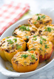 Cheesy Quinoa Black Bean Stuffed Bell Peppers Recipe Simplyrecipes Com Recipe Stuffed Peppers Recipes Bell Pepper Recipes