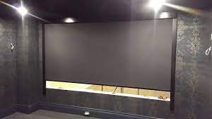 A living room in the day and a cinema at night although electric blinds and curtains can take care of any light leakage. Smart Shades Systems Home Theatre Room Divider With Full Blackout Youtube
