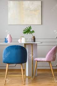 The attractive multifunctional tableif you take a look at the design, you. Velvet Pastel Pink And Petrol Blue Chairs At Small Dining Table Stock Photo Picture And Royalty Free Image Image 130624790