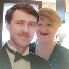 Michelle Bourke holidays with cardboard cutout of husband Paul