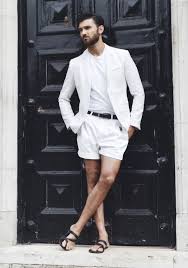 Black And White Party Outfits For Guys Men S White Blazer White Crew Neck T Shirt White Shorts Black Leather Sandals White Outfit For Men Mens Casual Outfits Mens Outfits