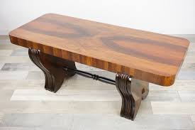 Enjoy free shipping & browse our huge selection of living room furniture, coffee table sets, console tables and more! Art Deco Wooden Coffee Table 86218