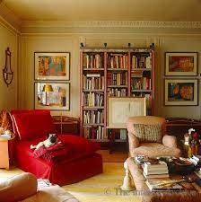 + add or change photo on imdbpro ». John Stefanidis As Usual The Dog Gets The Best Seat In This Case A Bright Red Chaise Longue In The Cosy Livin Red Living Room Decor Interior Living Room Red