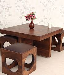 4.5 out of 5 stars. Ethnic India Art Solid Wood Coffee Table With 4 Stools Buy Ethnic India Art Solid Wood Coffee Table With 4 Stools Online At Best Prices In India On Snapdeal