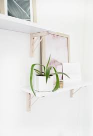 I based them on this plan here (though i altered all the dimensions to suit my taste and needs) Diy Modern Wood Shelf Brackets