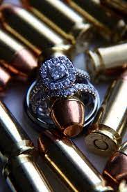 Police Wedding Rings And Bullets Wedding Ring Close Up Engagement Police Wedding Cop Wedding