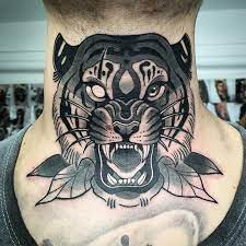 Neo Traditional Tiger Tattoo On A Throat Done By Our Resident Artist Andre Vasquez Call Us Today 351 Tattoos Traditional Tiger Tattoo Tiger Head Tattoo