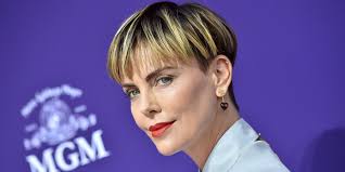 Charlize theron's blonde short pixie is styled so perfectly that it would work for any spcial event such as a wedding. Charlize Theron Trades In Bowl Cut For Shorter Blonder Hairstyle Photos Allure