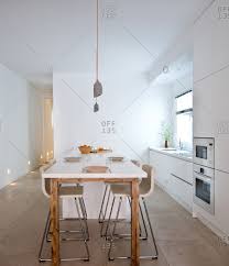 Dark floors feel so scandi to us, especially when paired with bright white counters (double points for a waterfall edge). Scandinavian Home Decor Stock Photos Offset