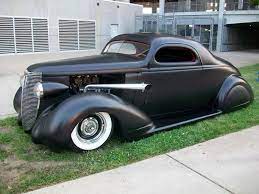 Seriously Amazing Custom In Satin Black Paint With Tall Zoomies Chop Top Rear Fender Skirts And Complete Classic Cars Trucks Custom Cars Paint Hot Rods Cars